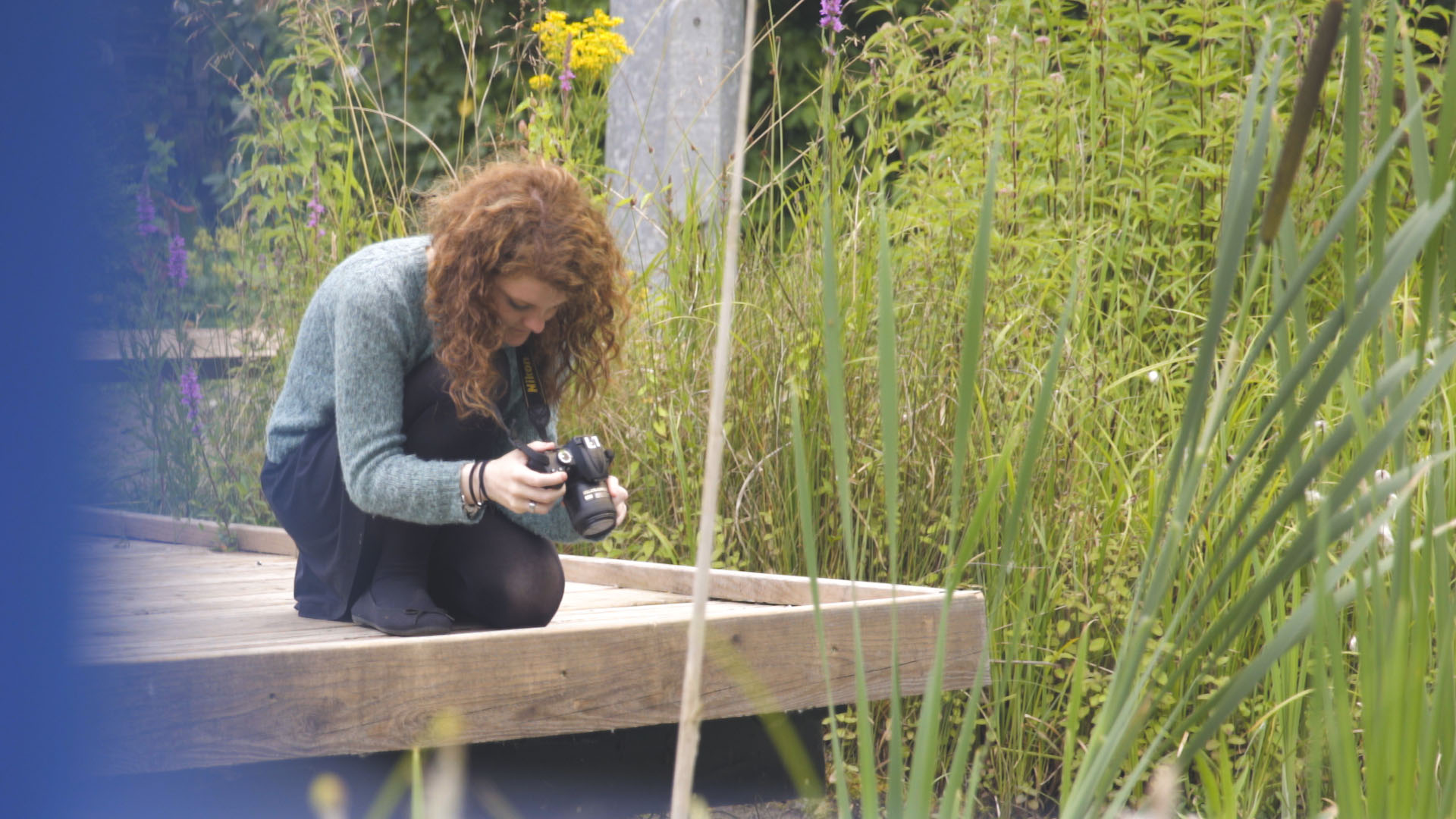 Photo of young person taking photos