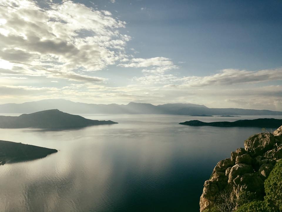 Photo of a lake under a mountain