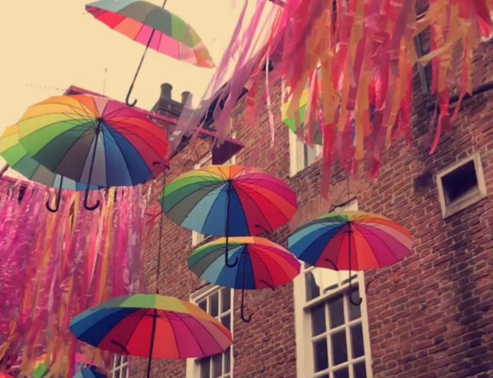 Photo of umbrellas with rainbow colours on it